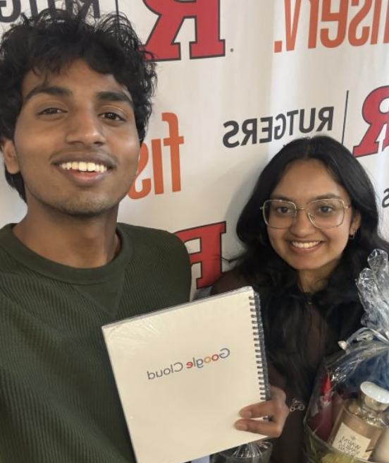 Rishab and Mayukha celebrating their Rutgers HackDay win