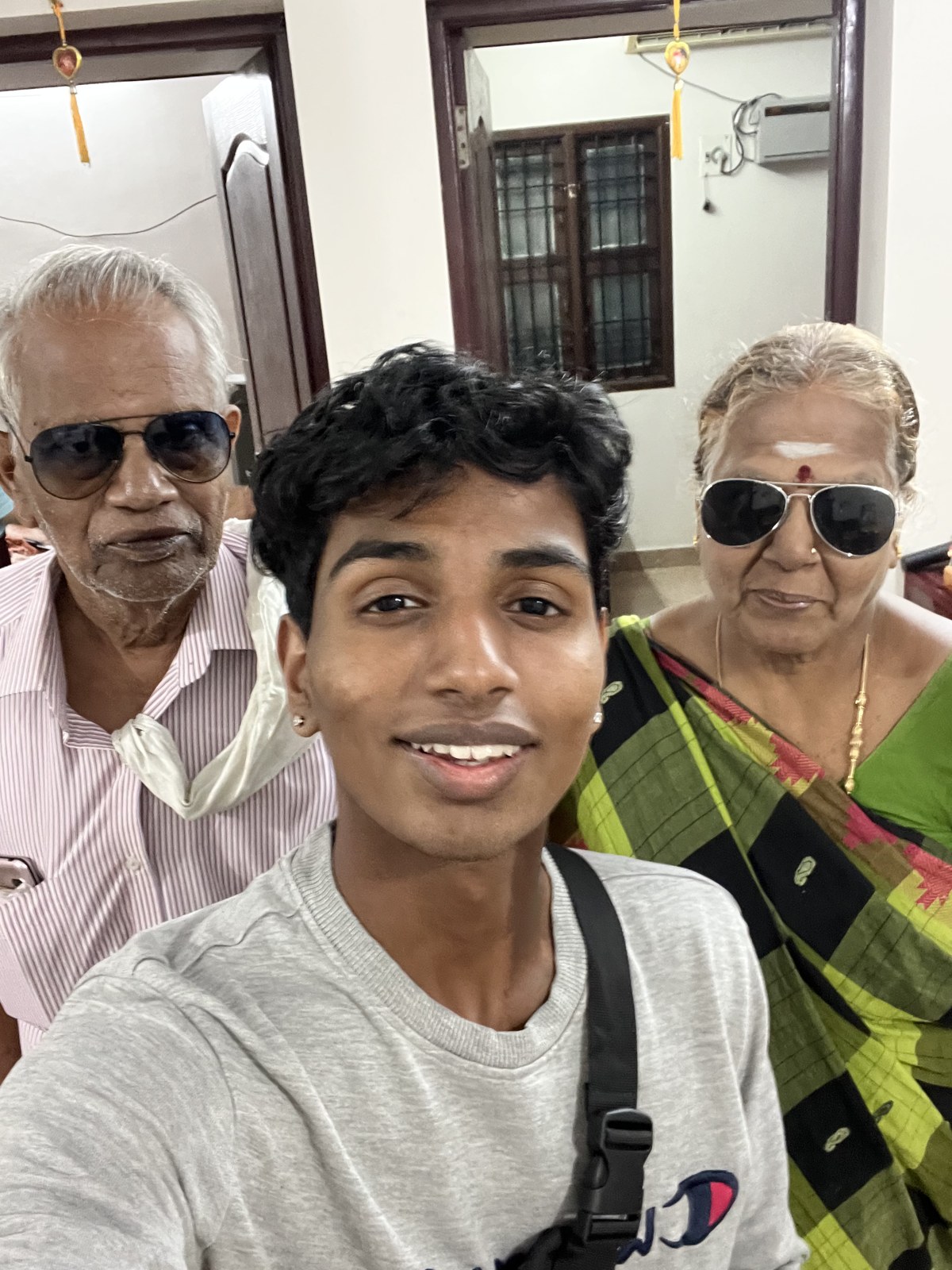 Rishab with his grandparents